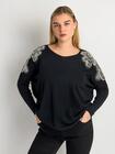 Sweter z aplikacjami na ramionach