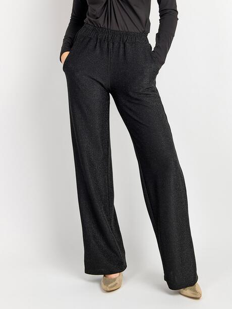 Błyszczące spodnie