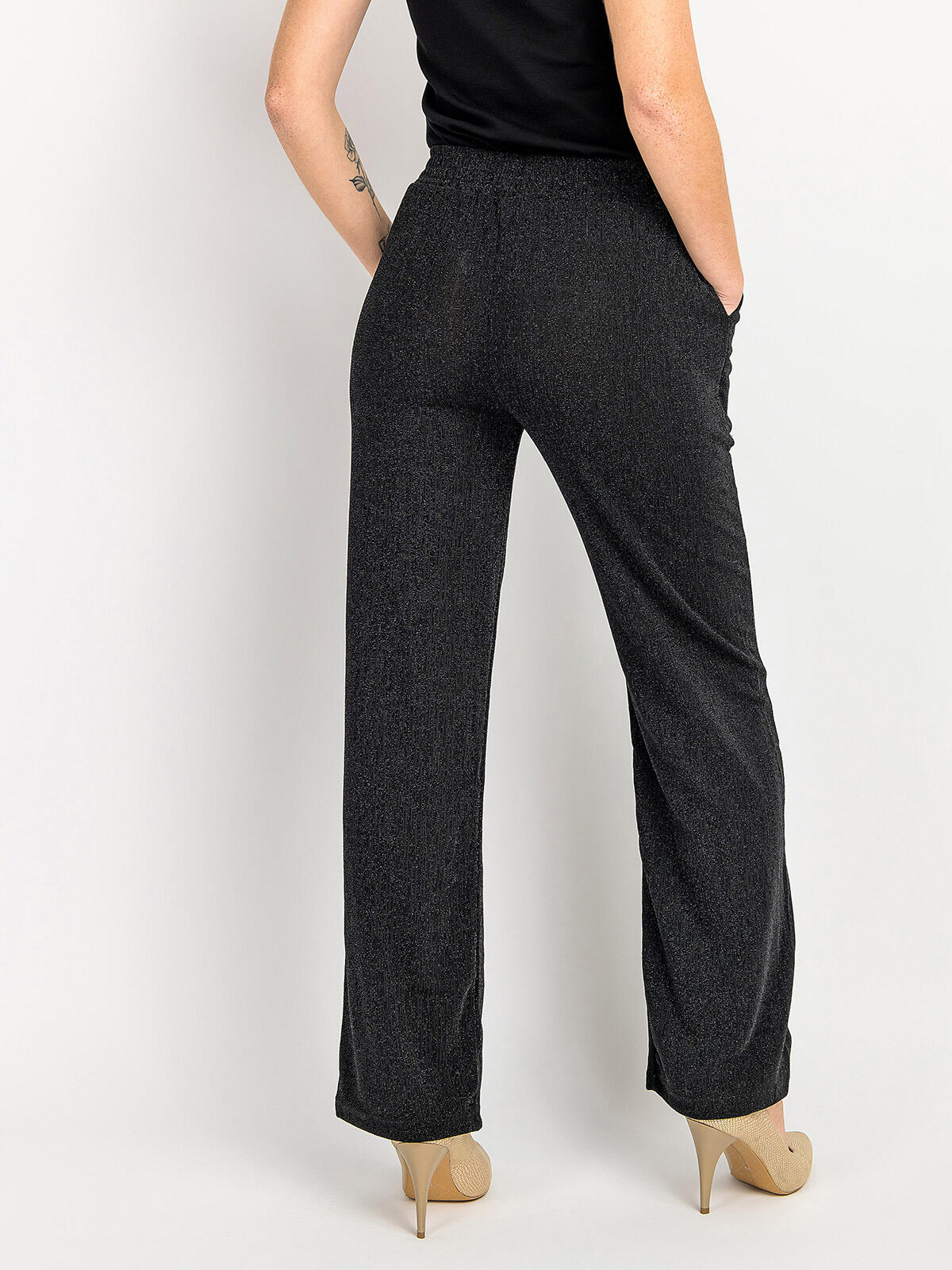 Błyszczące spodnie