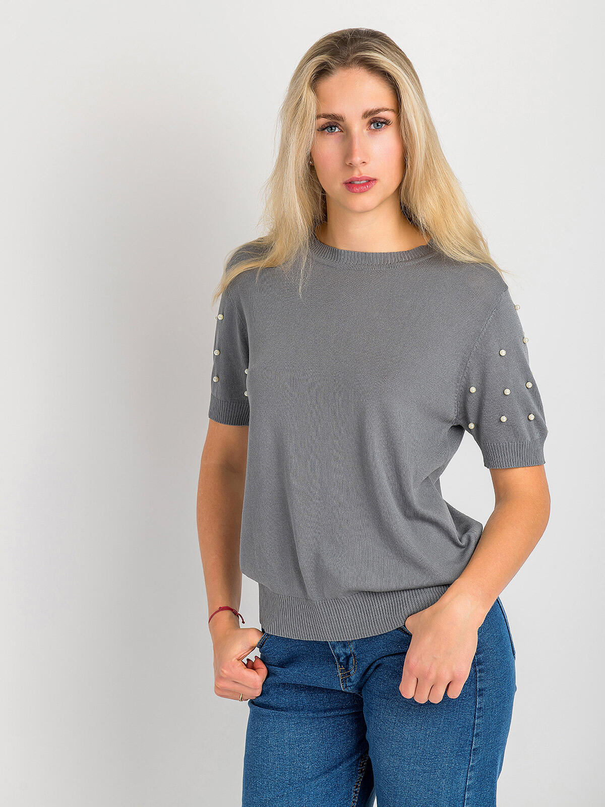 Sweter z ozdobnymi rękawami