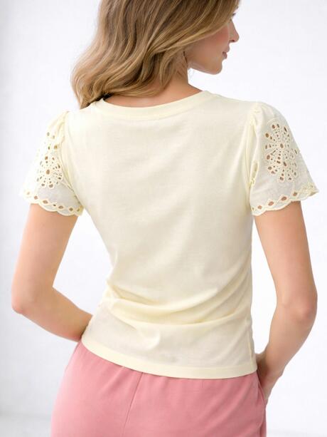 Bawełniana bluzka z ażurowym rękawem