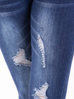 Spodnie jeansy z dziurami SKINNY