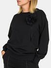 Bluza z ozdobnym kwiatem