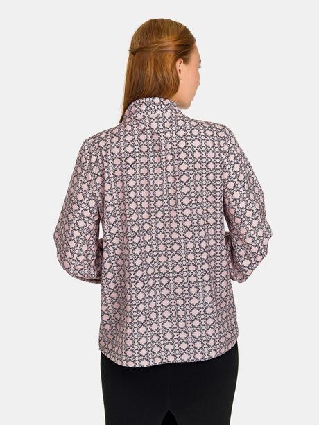 Wzorzysta bluzka z wiązaniem